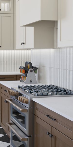 A kitchen with Glencove cabinets in Saddle