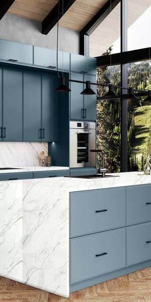A kitchen with Highland cabinets in Adirondack Blue