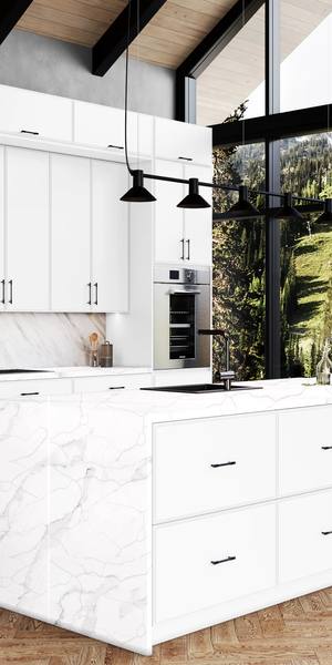 A kitchen with Highland cabinets in White