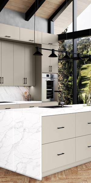 A kitchen with Milano cabinets in Sand