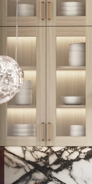 A kitchen with Woodbourne cabinets in Wheat